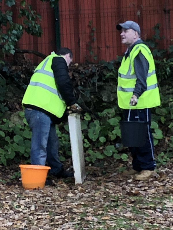 Vane Hill ARBD care home residents cleaning war graves as part of a new 'Eyes On, Hands-On' project run by The CWGC