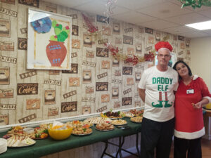 Campania ARBD care home chefs in front of their Christmas buffet