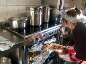 Vane Hill ARBD care home resident cooking the Christmas Day Lunch