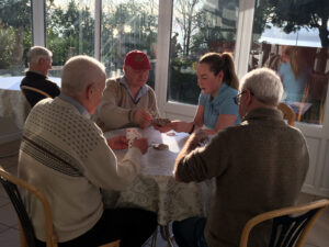 Cavan institute, Ireland, Nursing student playing cards with the residents at Vane Hill ARBD care home